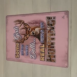 Buck Wear metal hunting sign